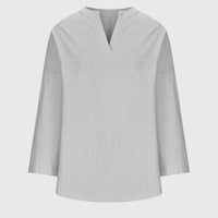 Camisa femenina sin mangas fluida con botones casual