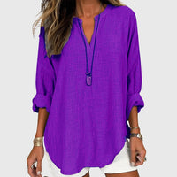 Camisa femenina sin mangas fluida con botones casual