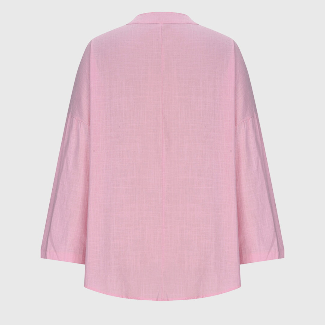 Camisa femenina sin mangas fluida con botones casual