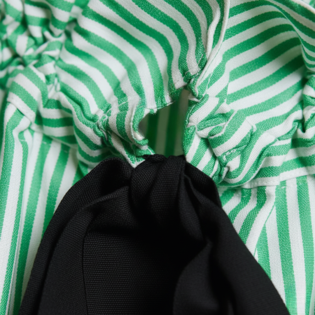 Blusa de mujer con rayas, volantes y lazo