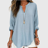 Camisa femenina sin mangas fluida con botones casual