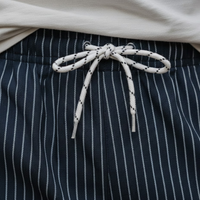Shorts de bain rayés blancs pour homme en polyester à séchage rapide avec taille ajustable
