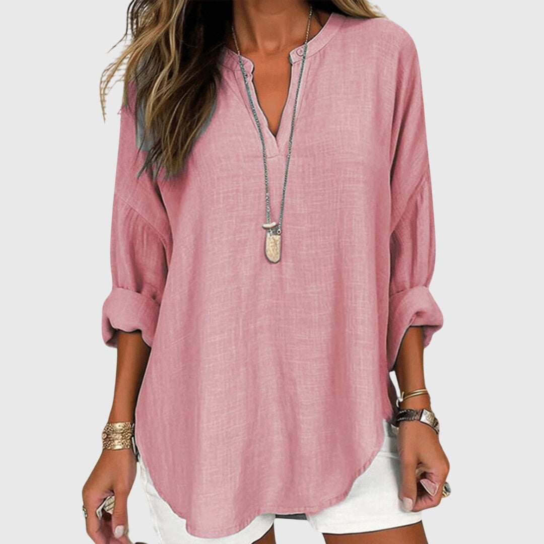 Camisa femenina sin mangas fluida con botones casual