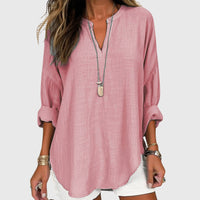 Camisa femenina sin mangas fluida con botones casual