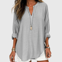 Camisa femenina sin mangas fluida con botones casual