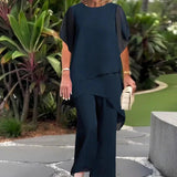 Conjunto elegante de top y pantalón para mujer | Bajo asimétrico superpuesto
