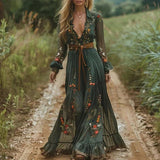 Vestido largo entallado de mujer con flores bordadas y falda de volantes