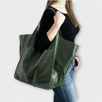 Women's Oversized Leather Weekender Bag | Structured Carry Angle
